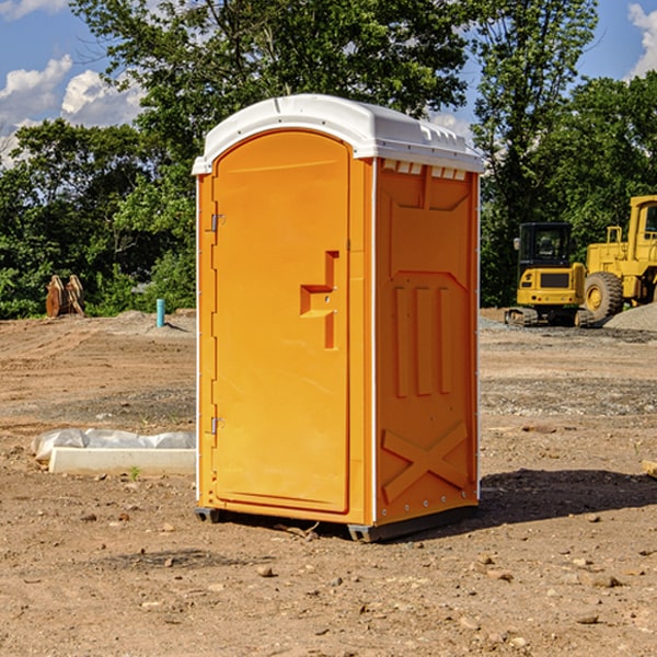 how often are the porta potties cleaned and serviced during a rental period in Minorca